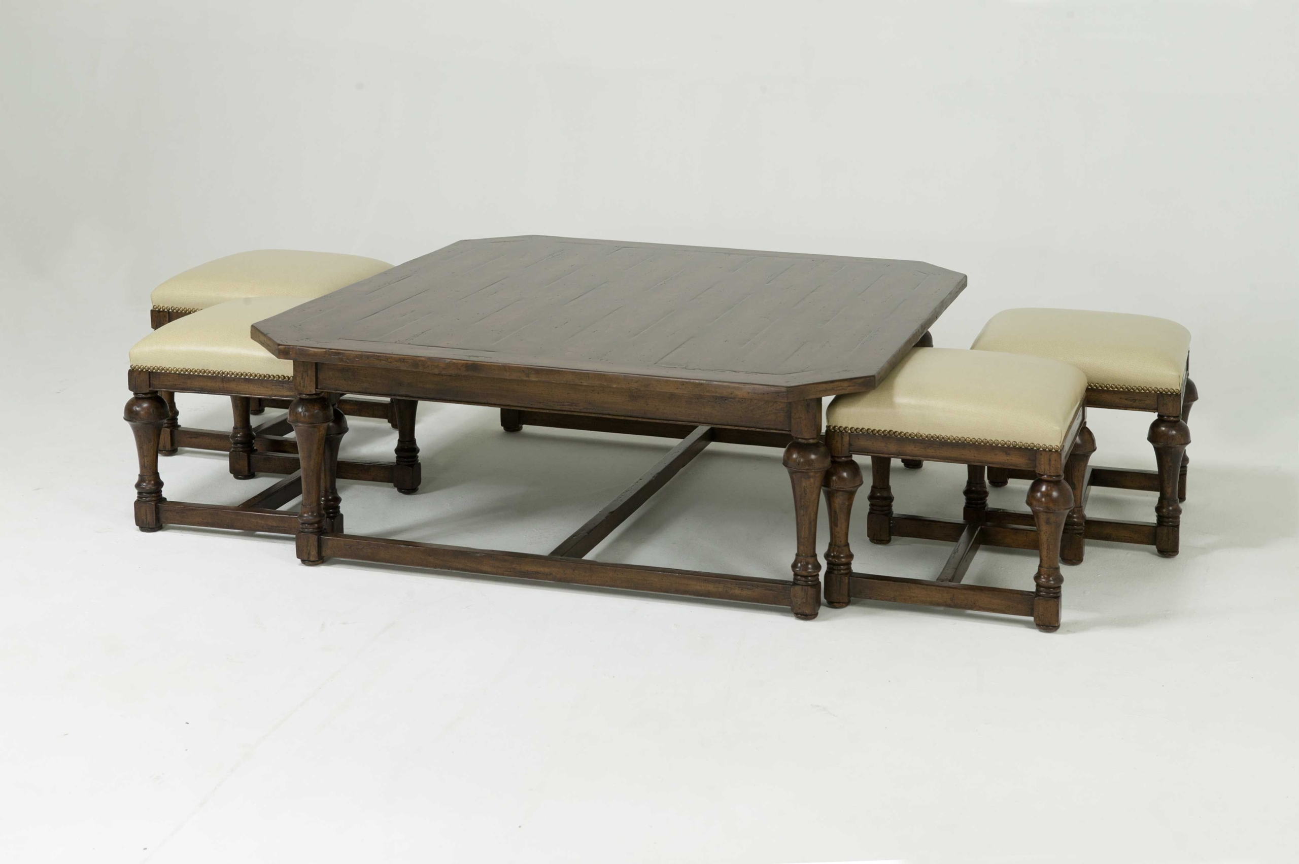 Coffee table with nesting ottomans 22