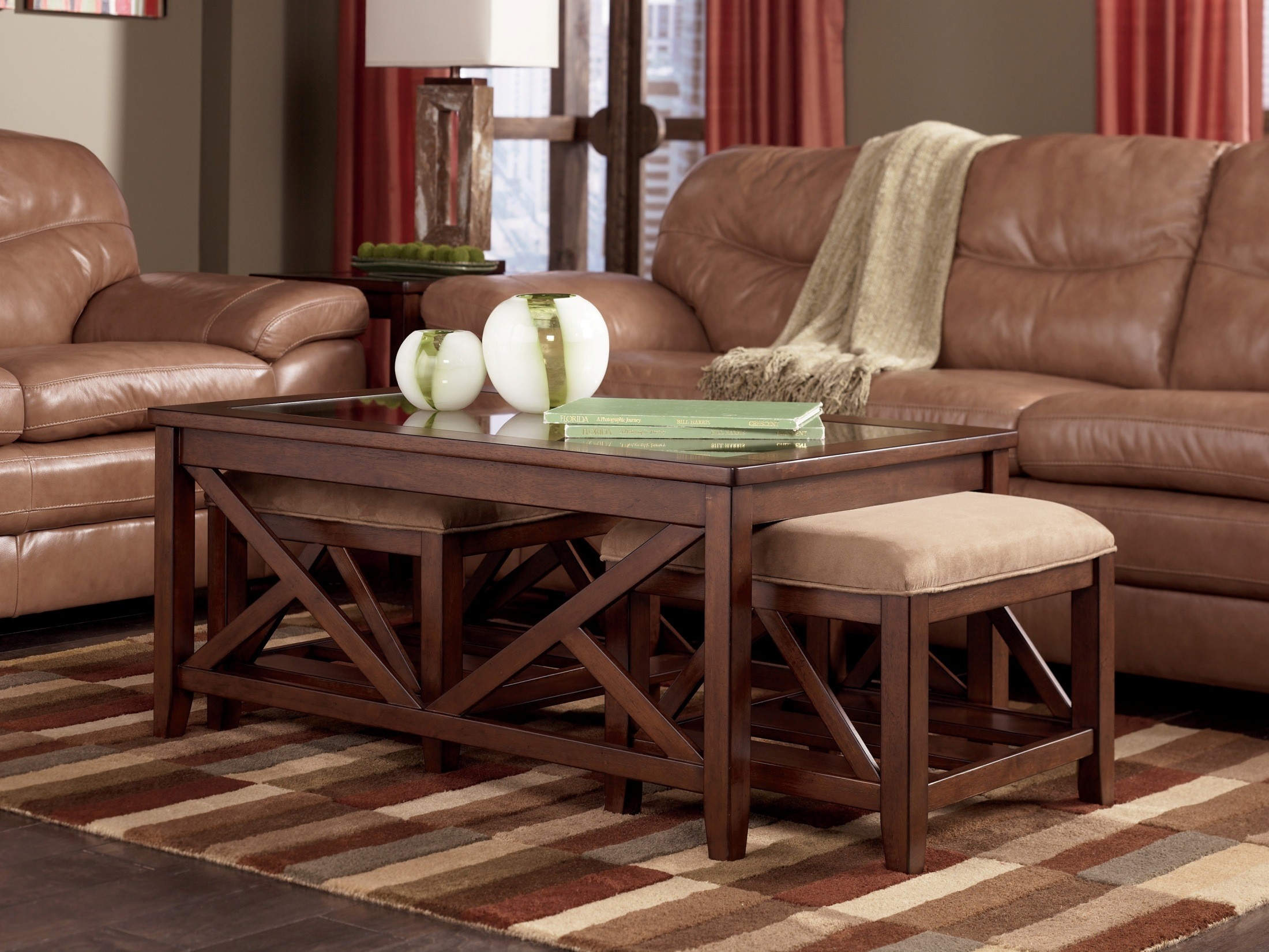 Coffee table with nesting ottomans 4