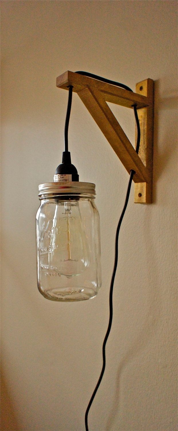 Hanging mason jar sconce light