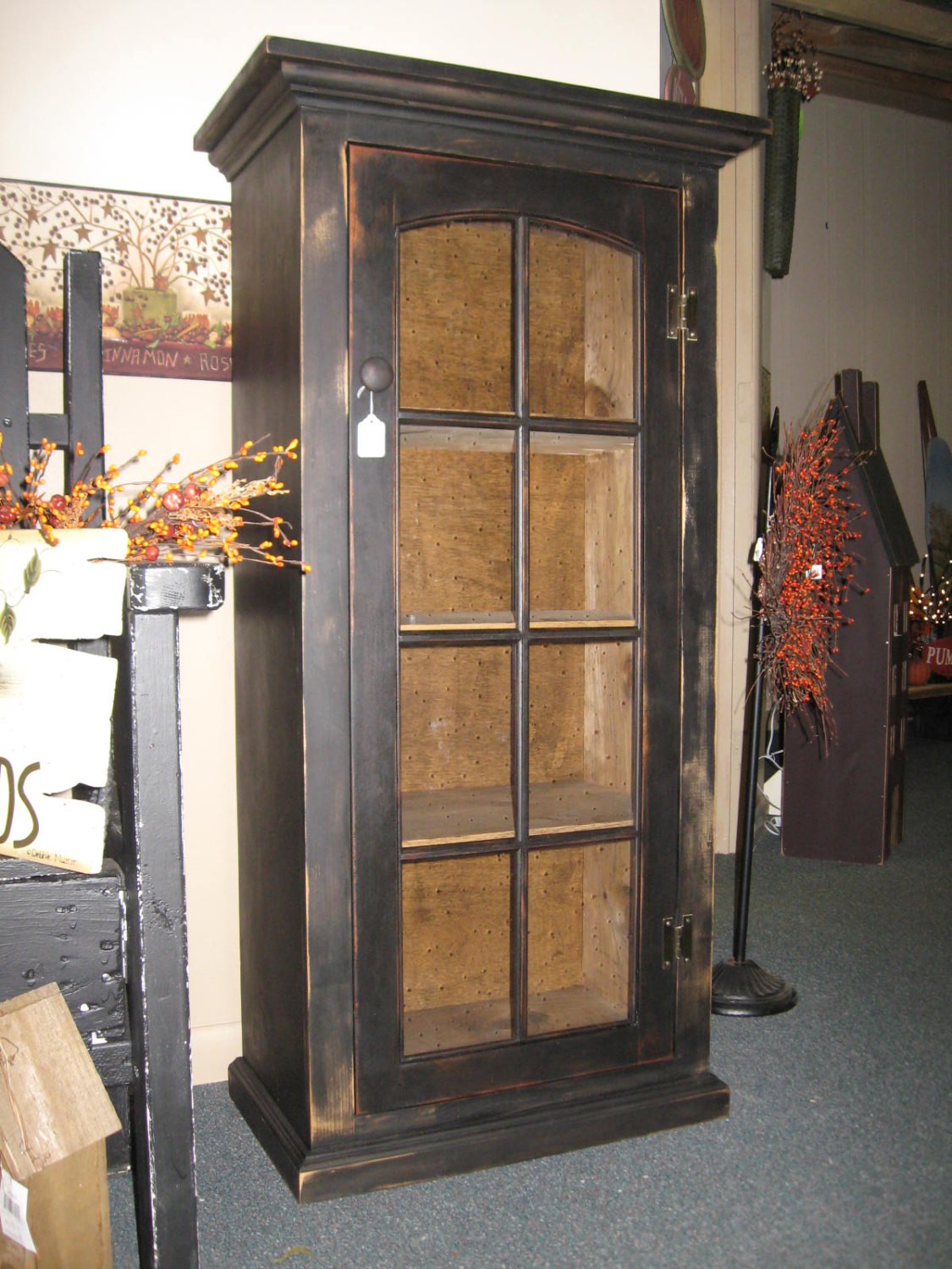 Primitive cabinet with glass door