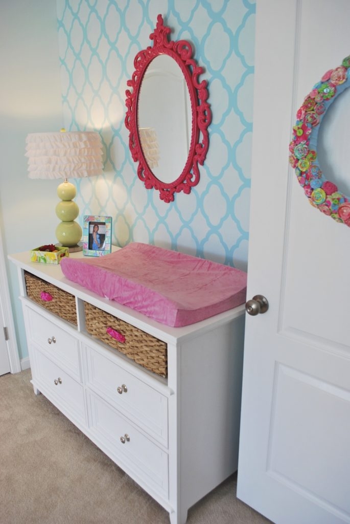 White baby changing table with drawers