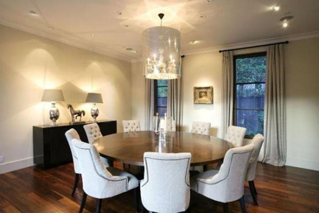 round dining table with 10 chairs