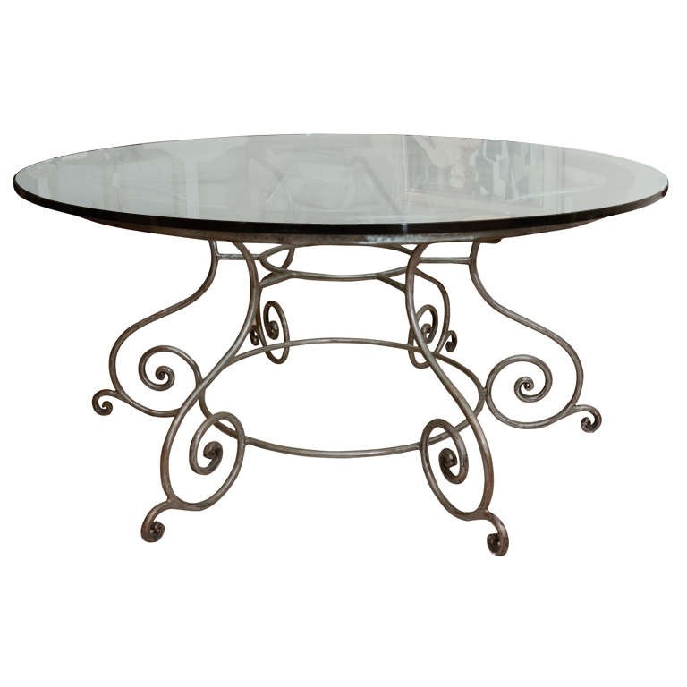 Round glass top coffee table wrought iron
