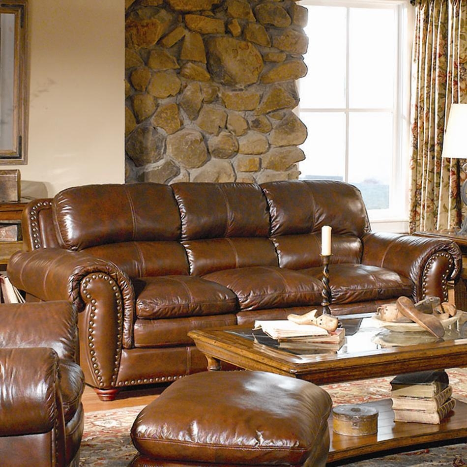Brown leather couch with nailheads