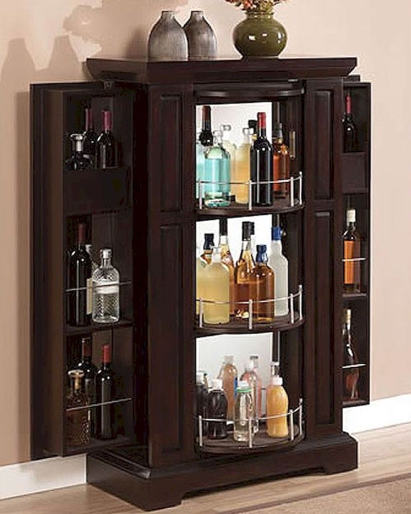 armoire turned into bar storage- yeah this is a necessity in my