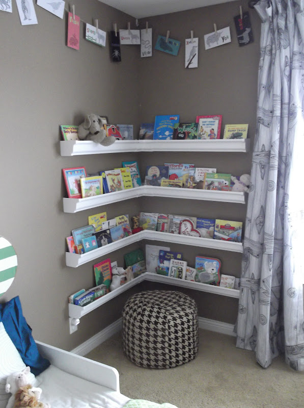 Rain gutters used as bookshelves for a kids room you
