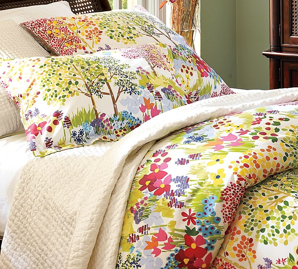 Colorful bedding for guest room with grey wall color would