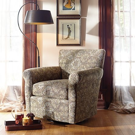 Duvall upholstered swivel glider chair in tanook spa
