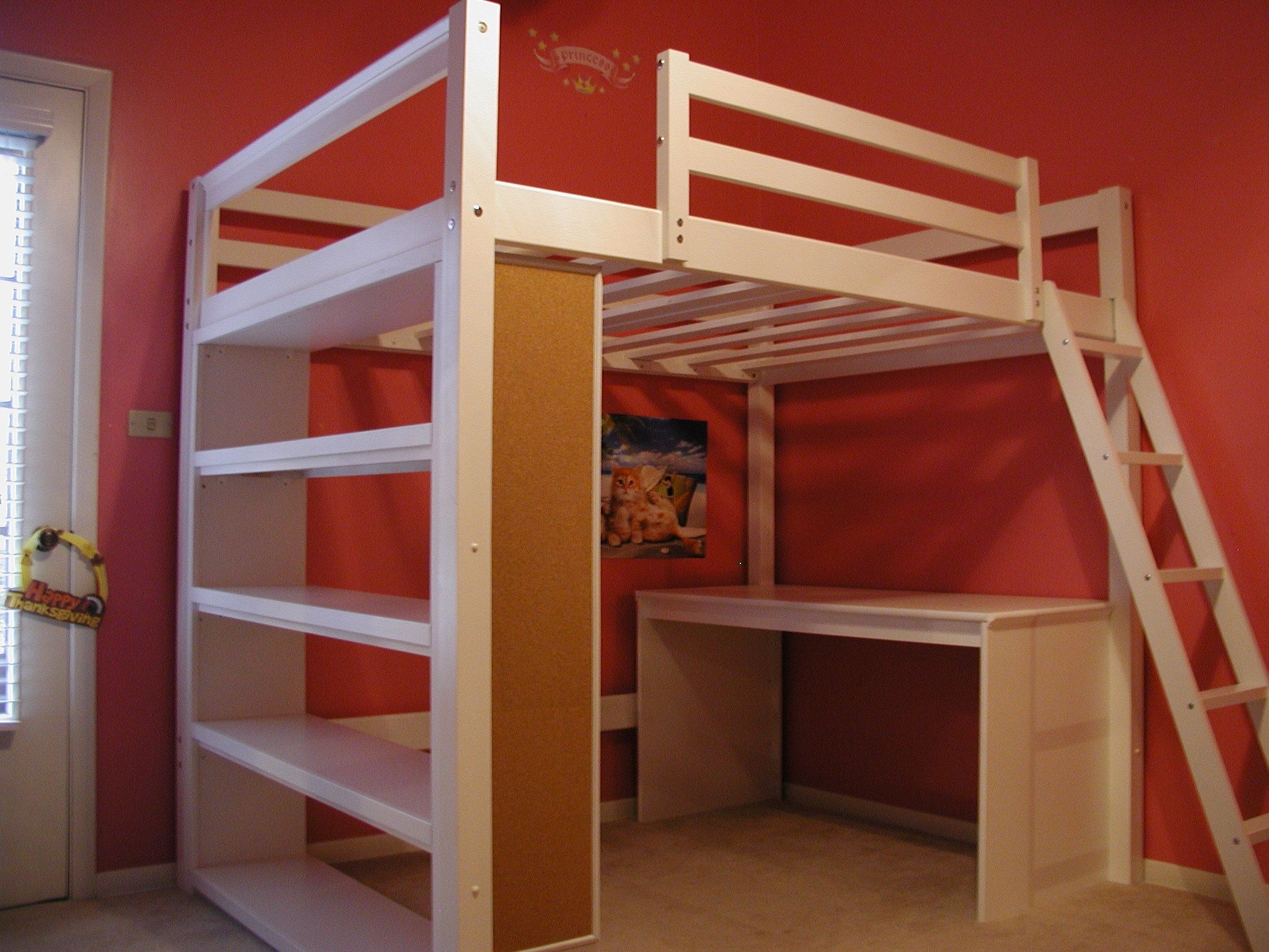 white wood loft bed with desk