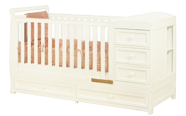 white crib with drawer underneath