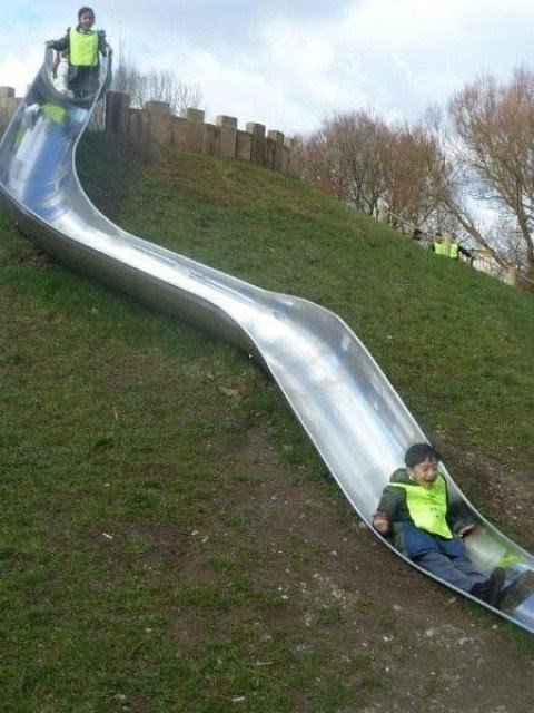 S embankment slide bespoke slides slides playground equipment