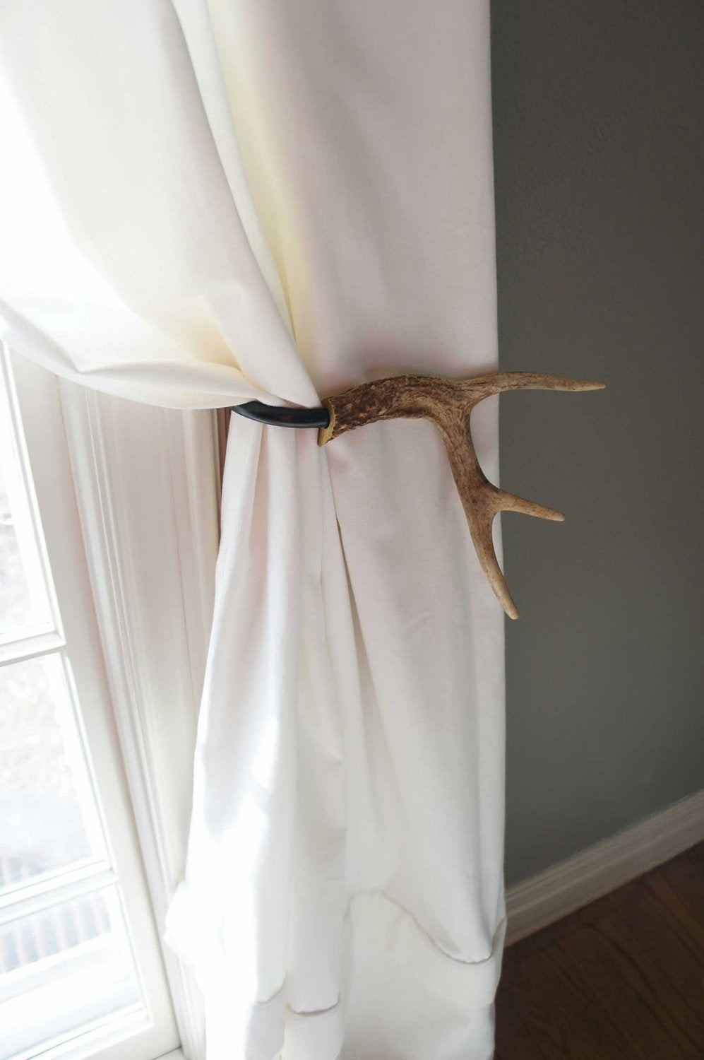 But hand paint them antler curtain tie back holdback cabin