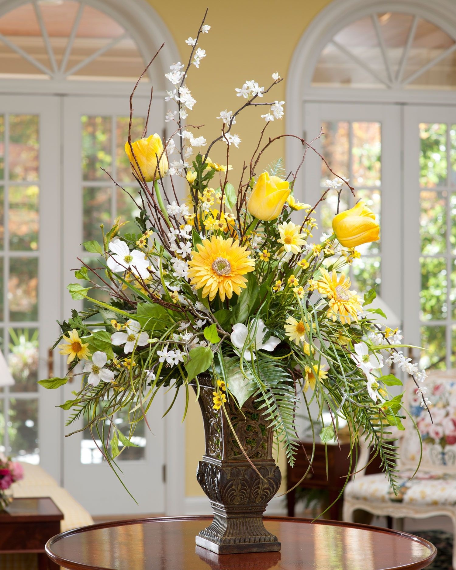Glass vase with artificial flowers