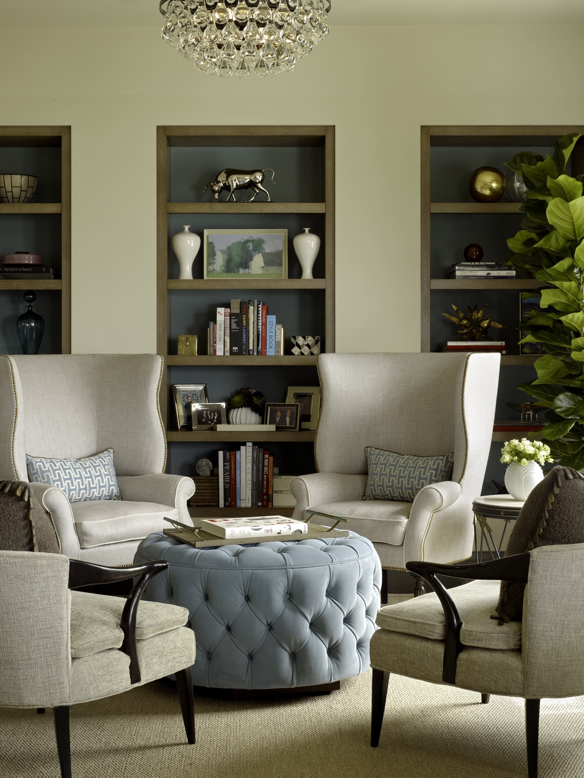 Instead of sofas create an intimate seating group with wingback