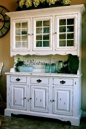 Distressed white cabinets