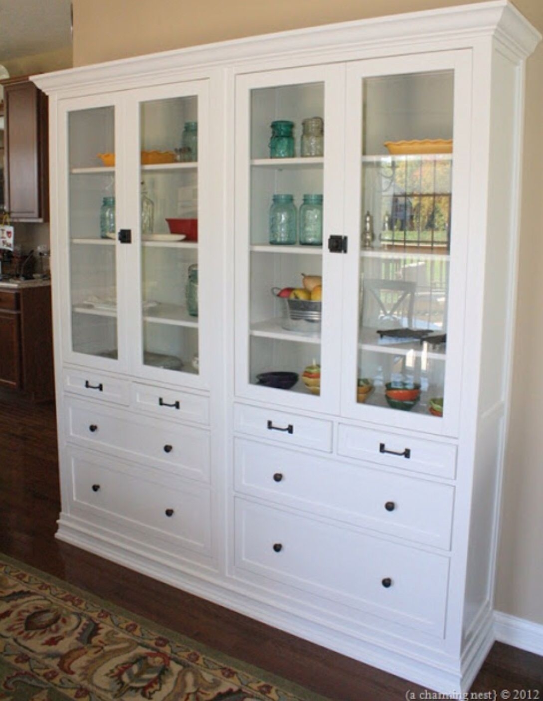 Two ikea units made into one custom cabinet they connected