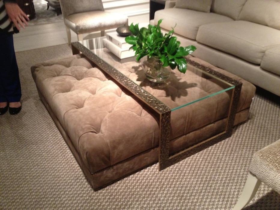 Glass coffee table with ottomans underneath