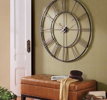 Large wall clock with roman numerals
