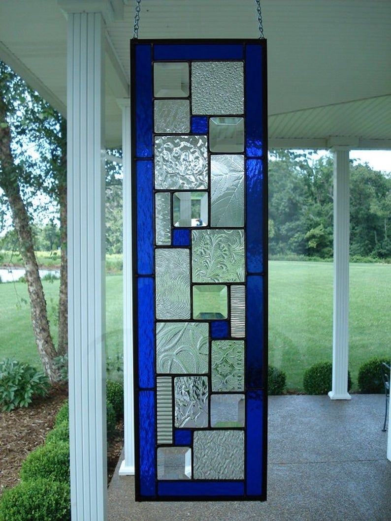 Stained glass panel deep blue window