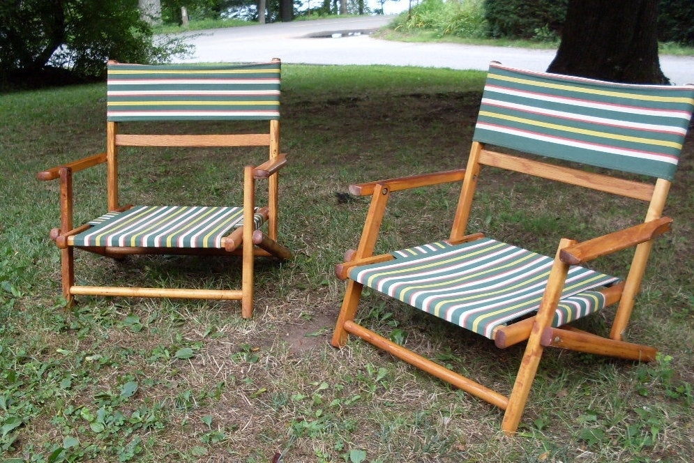 Two vintage folding wooden beach chairs