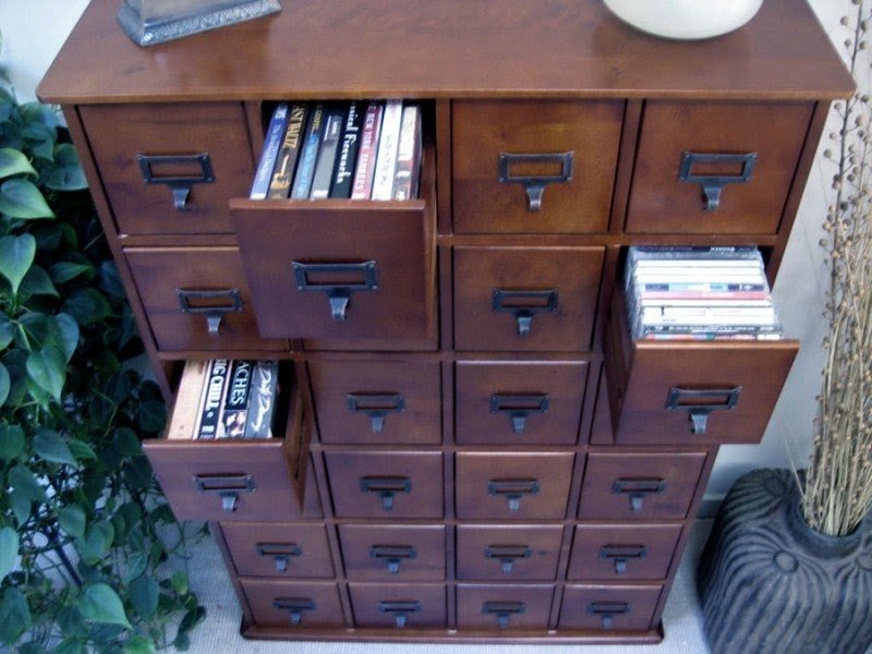 Dvd storage drawer cabinet
