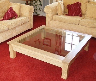 Glass table with oak legs