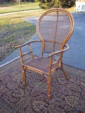 Mid century fan back rattan arm chair cane seat