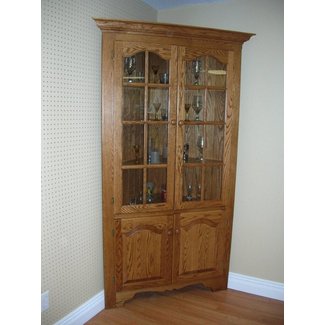 corner china cabinet with wooden shelves