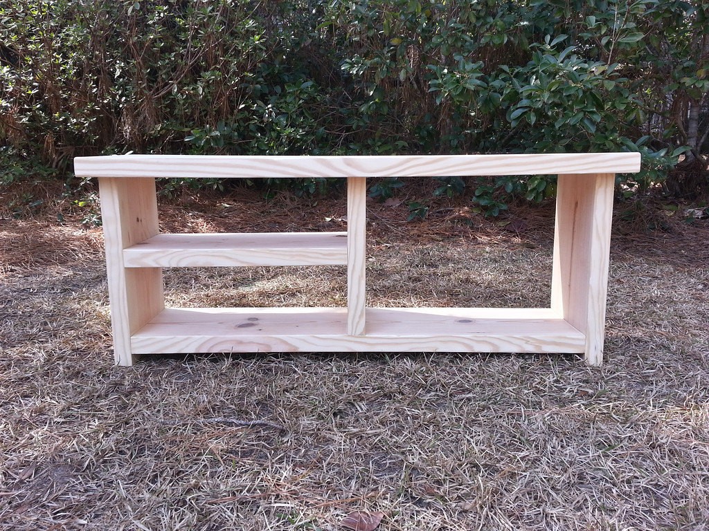Rustic wood bench with shoe rack and