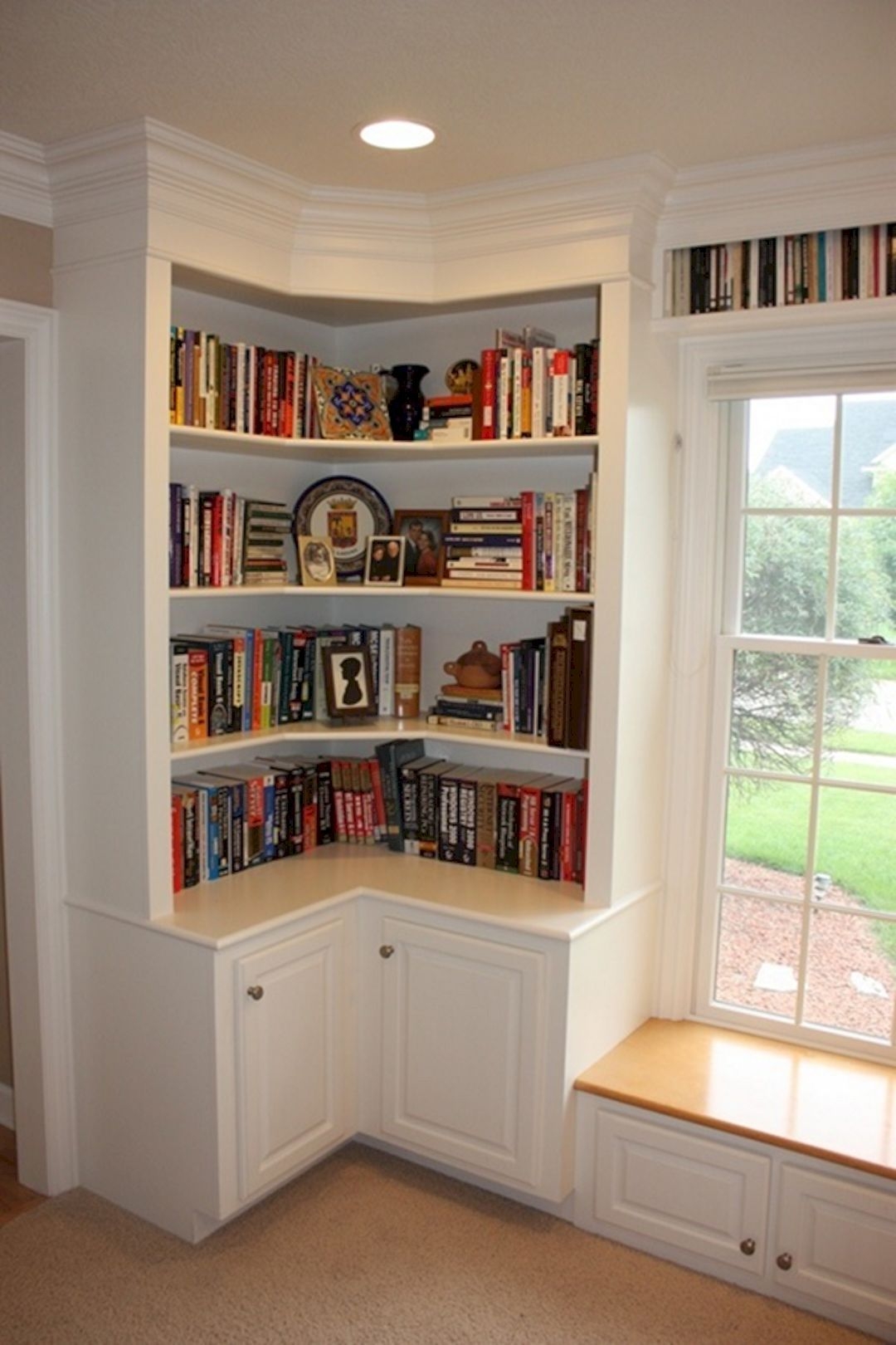 White bookshelf with doors