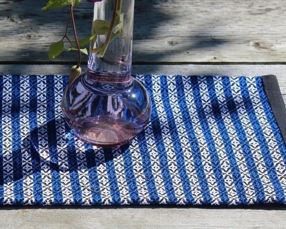 Handwoven placemat in royal blue white