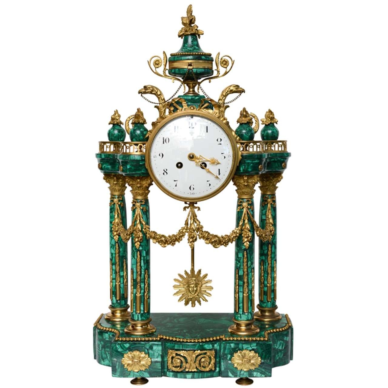 Important neo classical malachite and ormolu mantel clock 19th century