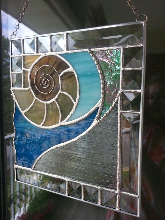 Nautilus shell stained glass panel
