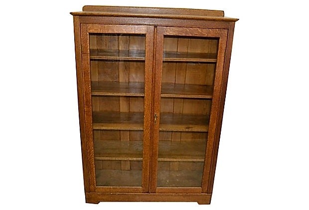 Oak bookcase with glass doors