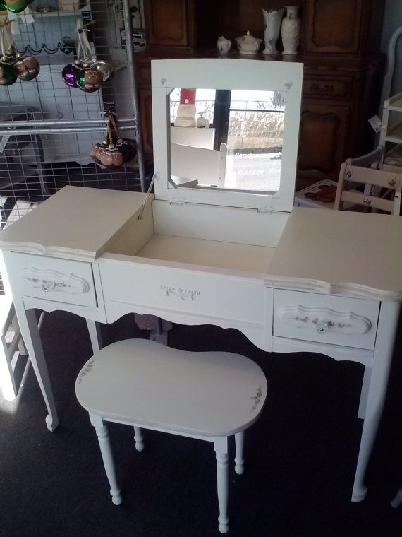 Vanity table with fold down mirror