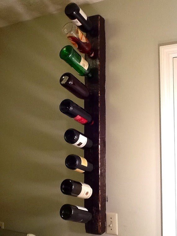 Vertical wall mounted wine rack