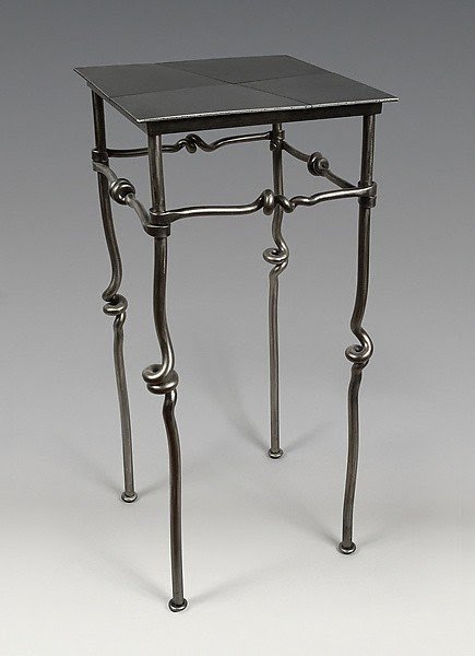 Black wrought iron bedside tables