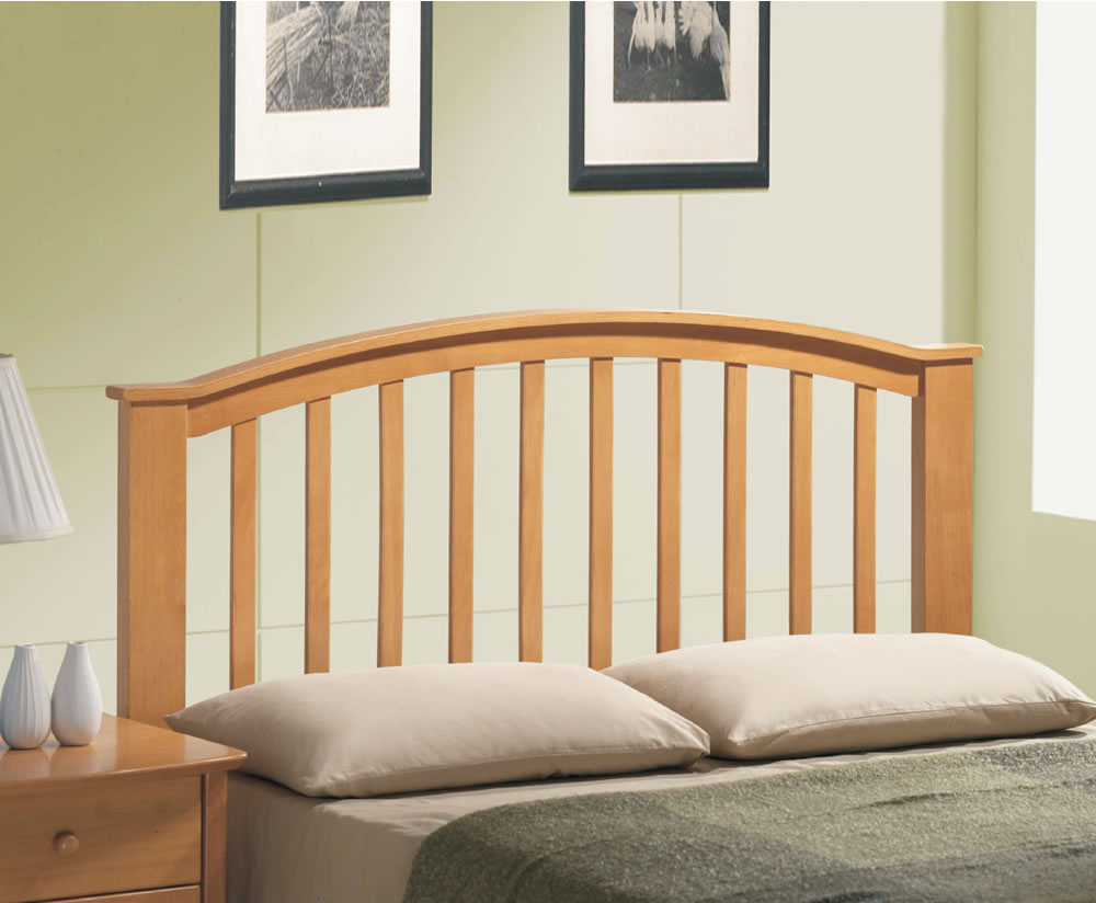 Double bed with antique brass headboard and footboard plus pine