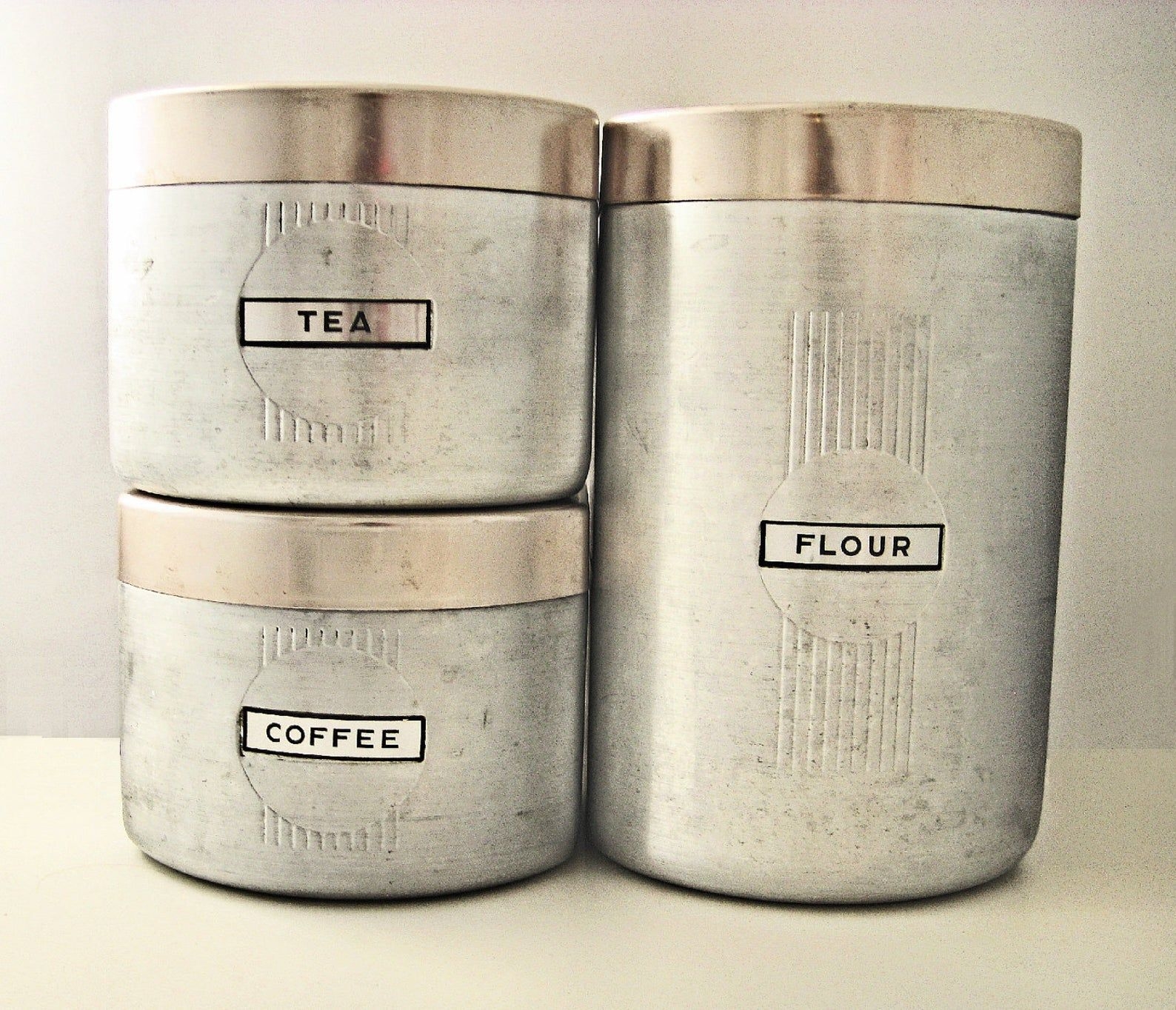 Vintage art deco aluminum canister set