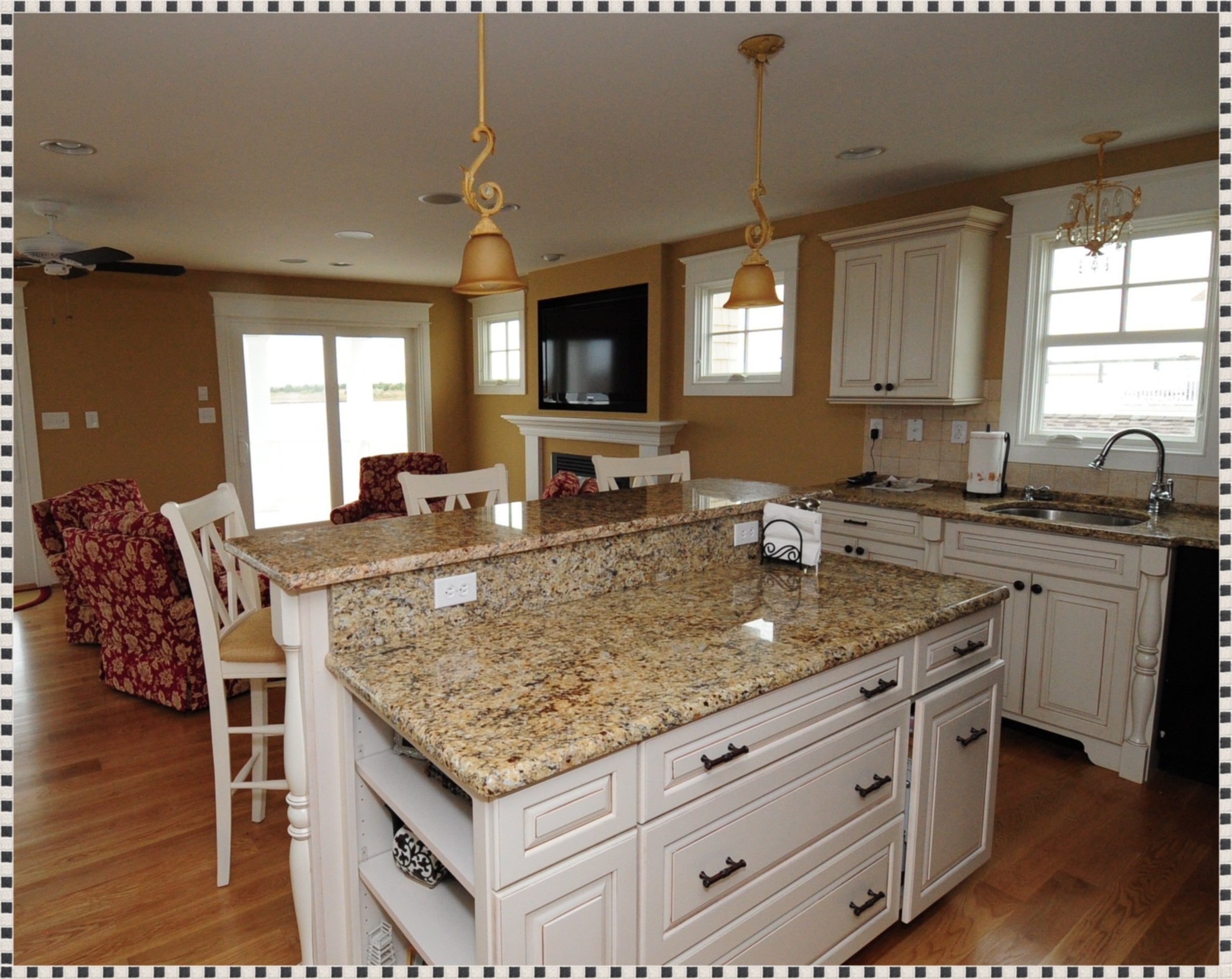 pictures of white kitchens with darker island and dark granite countertops