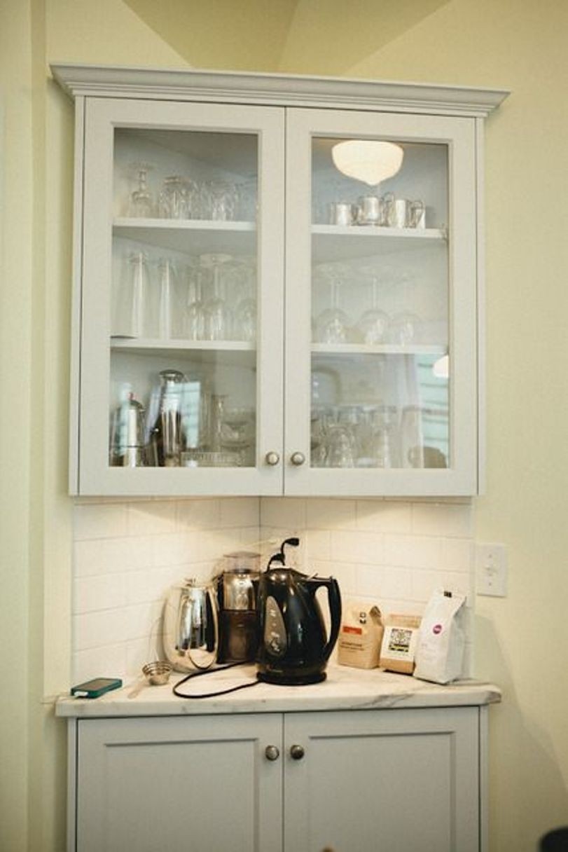 white corner cabinets dining room