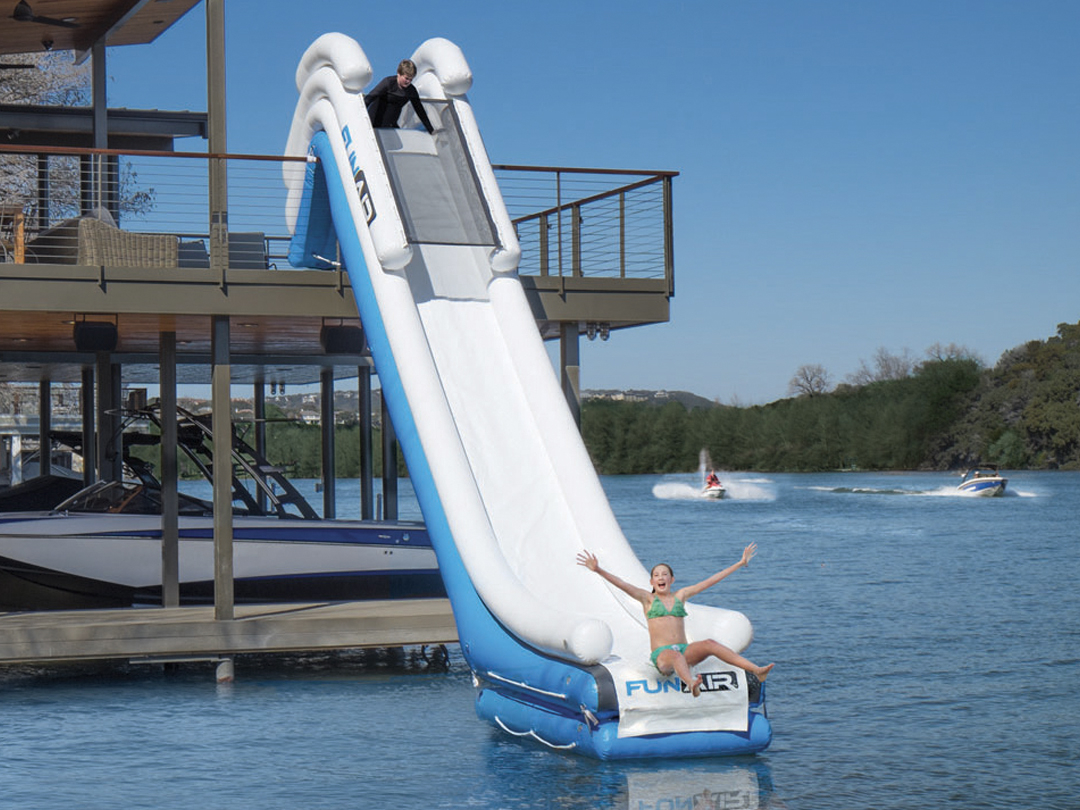 Inflatable floating water slide