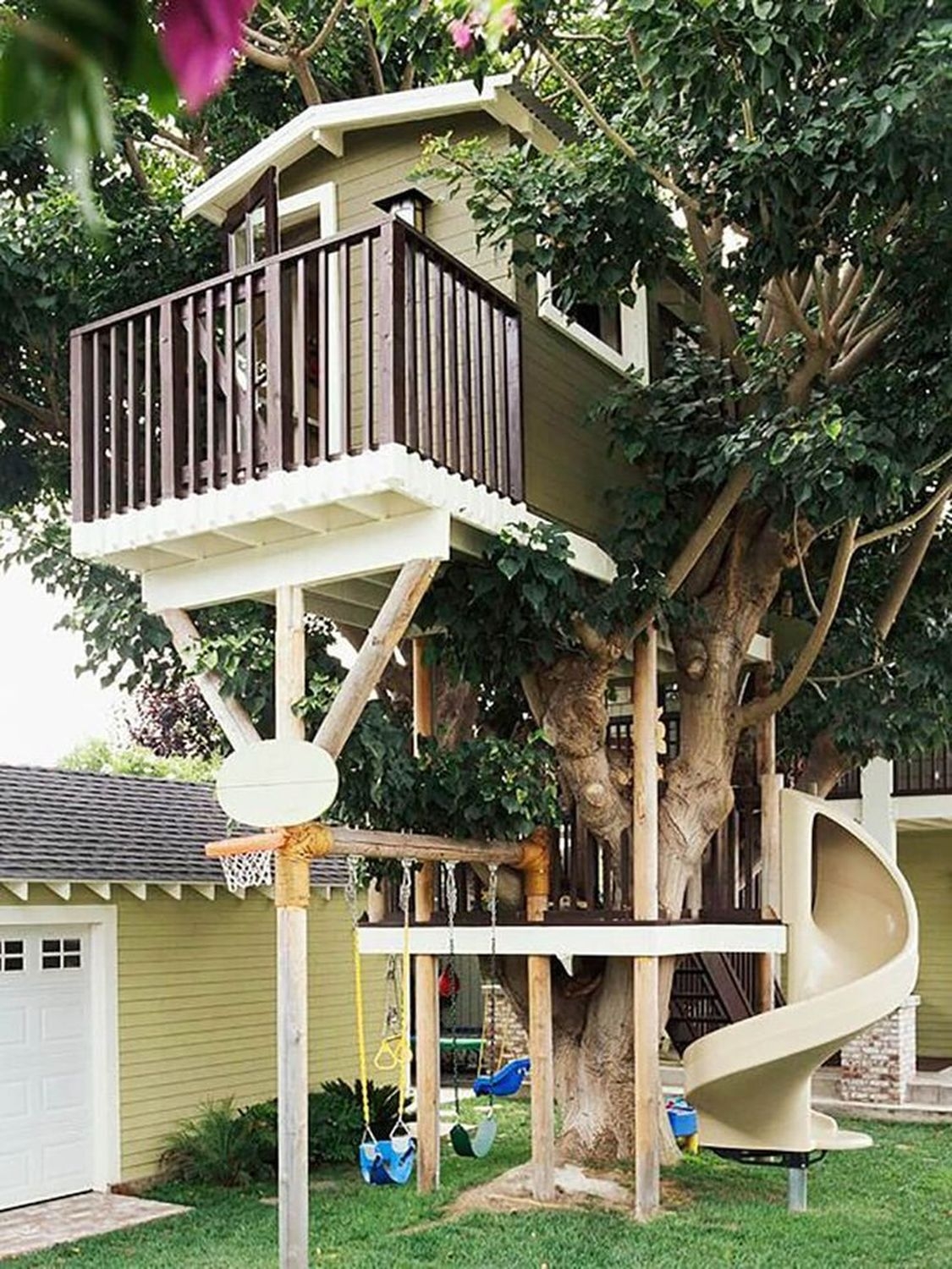 Wooden house with slide