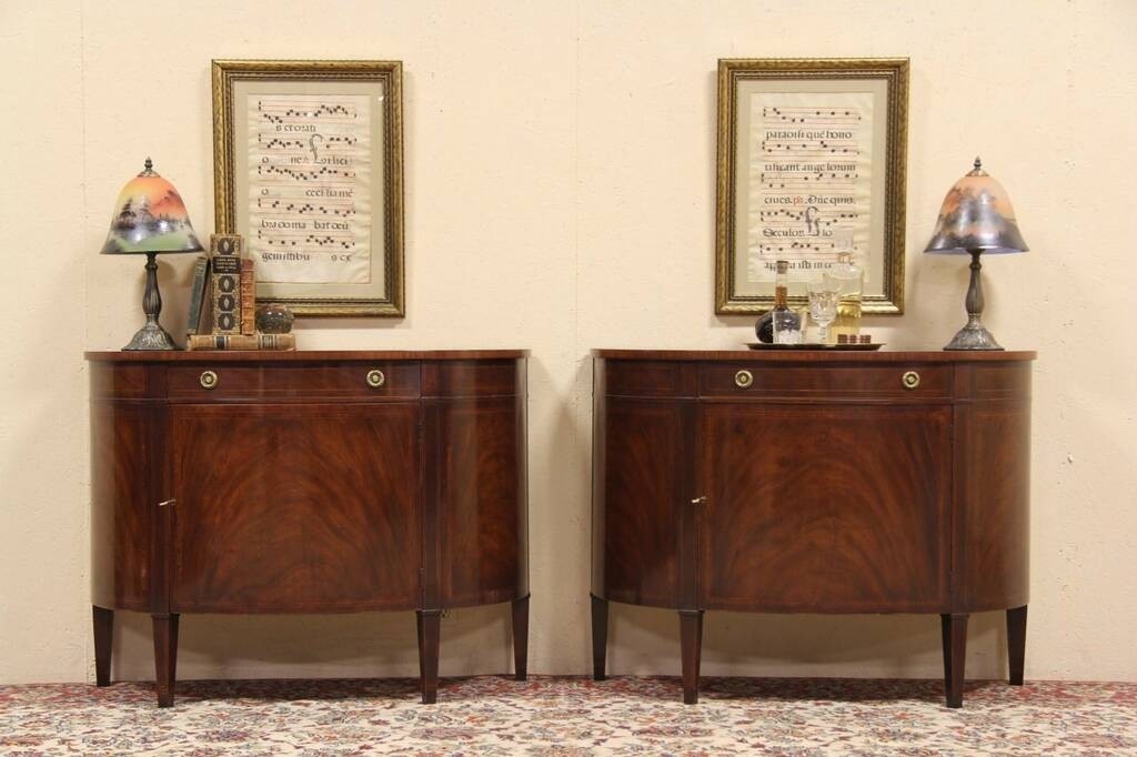 Pair baker demilune console cabinets