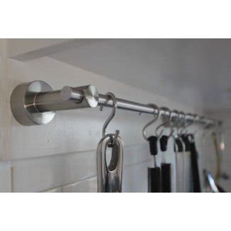 Wall mounted kitchen utensil holder