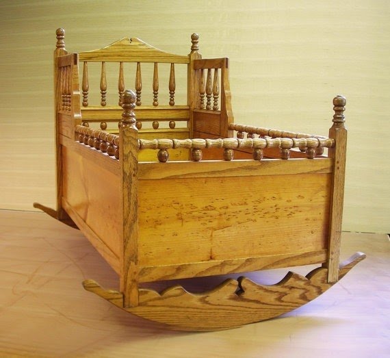 Handmade pilgrim baby cradle with turned