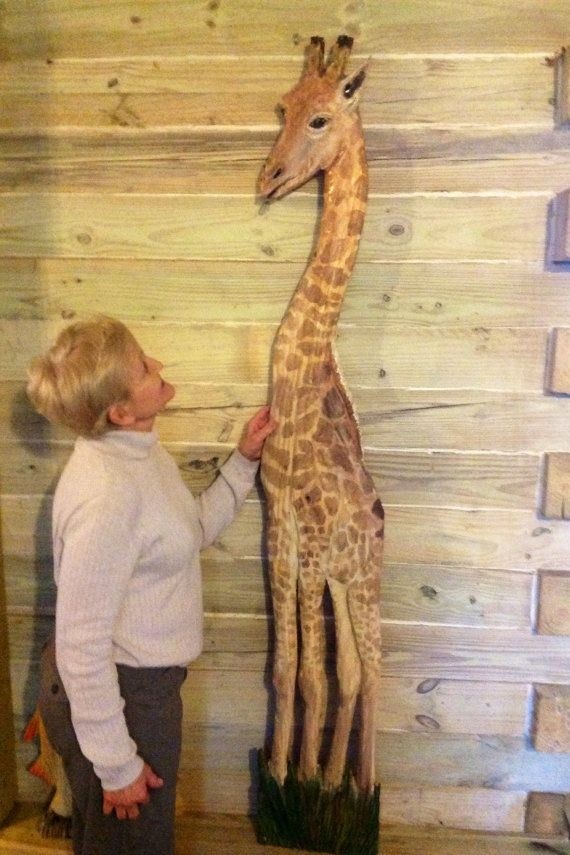 Giraffe chainsaw carving 6 ft tall