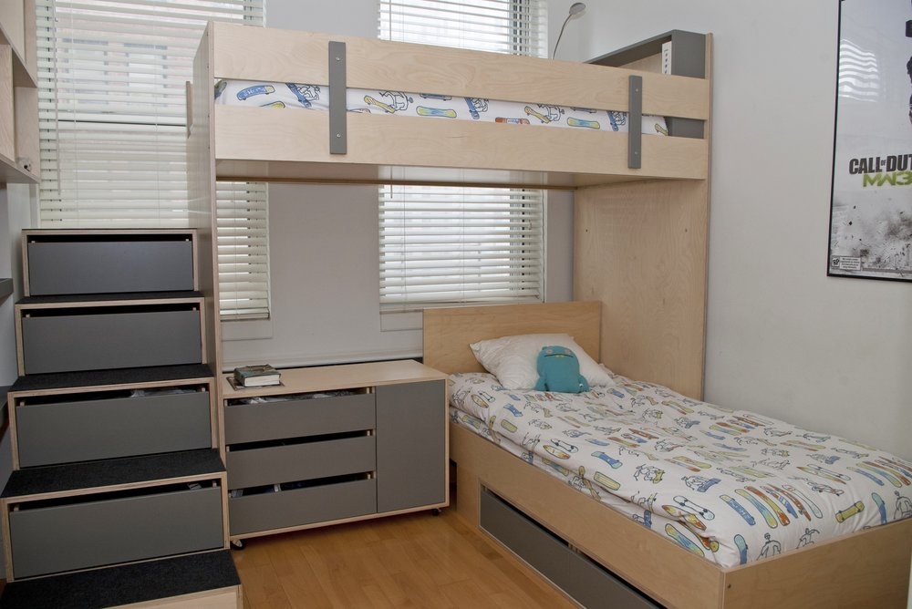 2 bunk beds in small room