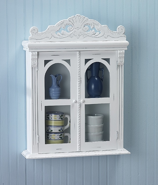 Order the distressed white arch wall cabinet today and save