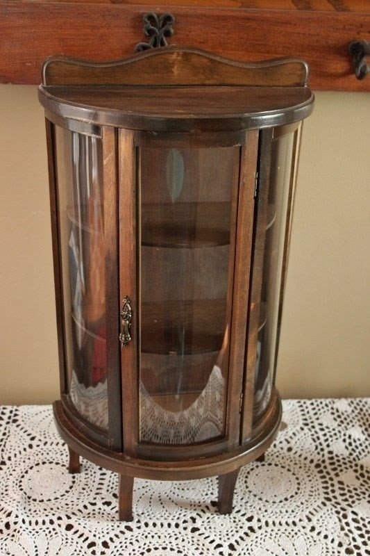 Small table store top curio cabinet